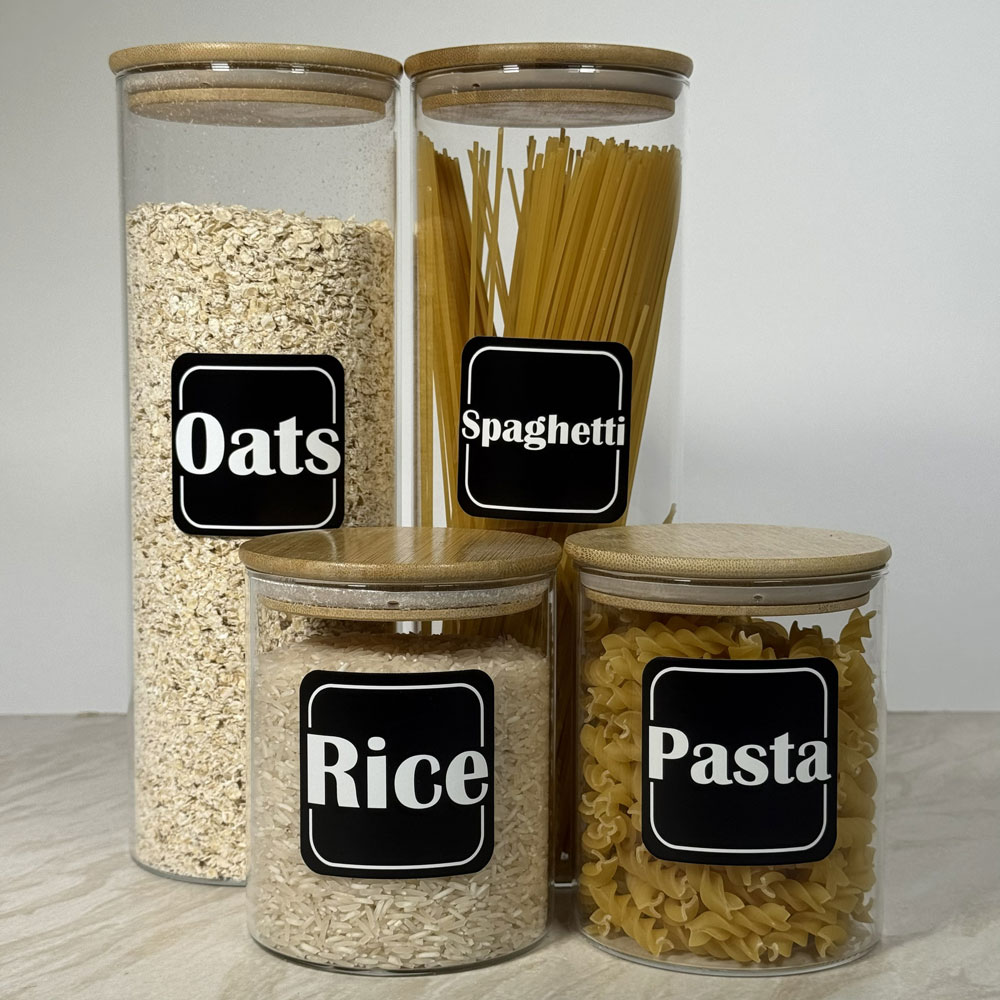 Picture showing labels on kitchen jars containing pasta, rice and oats